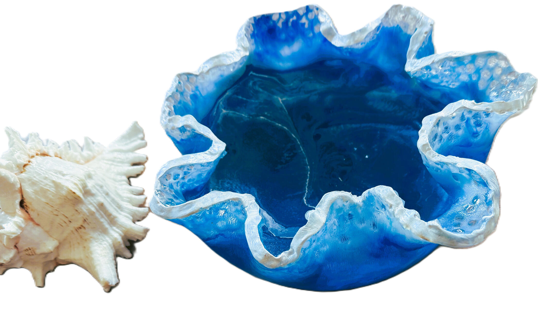 Ocean inspired decorative bowl Ocean inspired decorative bowl in deep ocean blue color and white edging to mimic the foamy effect of waves in the ocean